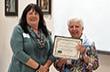 GAHWNY Executive Council Chair and Wyoming County Historian, Cindy Amrhein, presenting Pittsford Town and Village Historian Audrey Maxfield Johnson the award. 